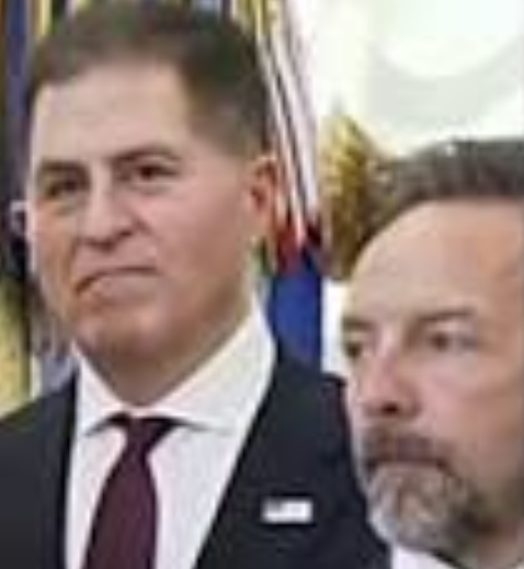 The other two people besides Trump and Dell looking like they might have smelled something bad too